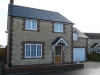 Sawn and split with brick quoins plinth and window surrounds in Marnhull